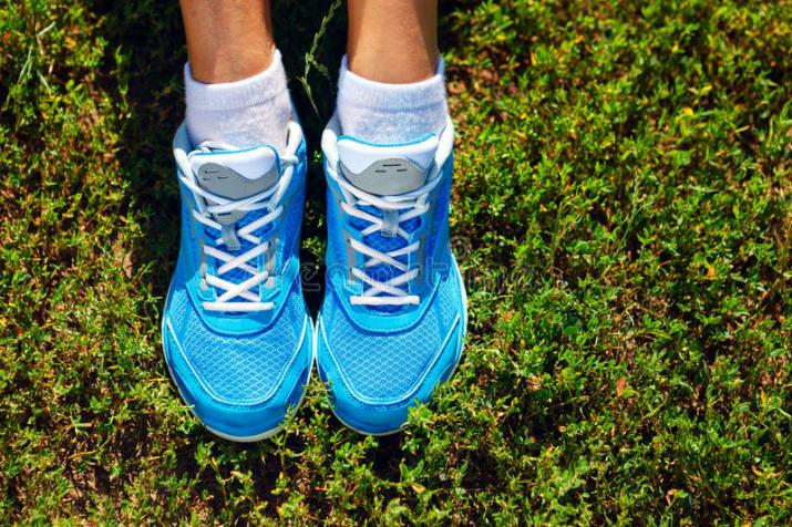 running shoes grass concept closeup image 32654734
